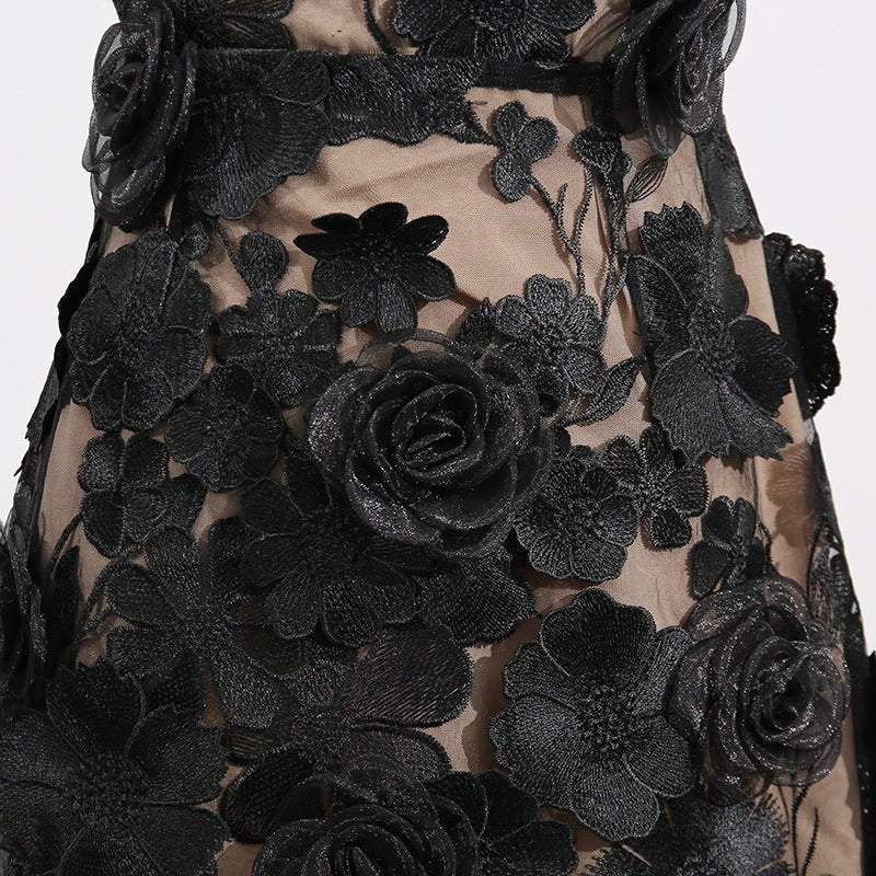 Naked Illusion Dress With Embroidered Flowers showcasing intricate floral designs in black on a sheer fabric