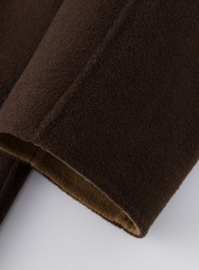 Close-up of the Nara Wool X Cashmere Hooded Coat in rich brown showcasing soft texture and quality fabric