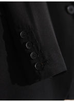 Close-up of AM Vision RO Natural Silk Blazer featuring stylish button detail on the sleeve