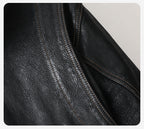 Close-up view of the Noir Atlas Hooded Goatskin Jacket showcasing the texture and stitching details
