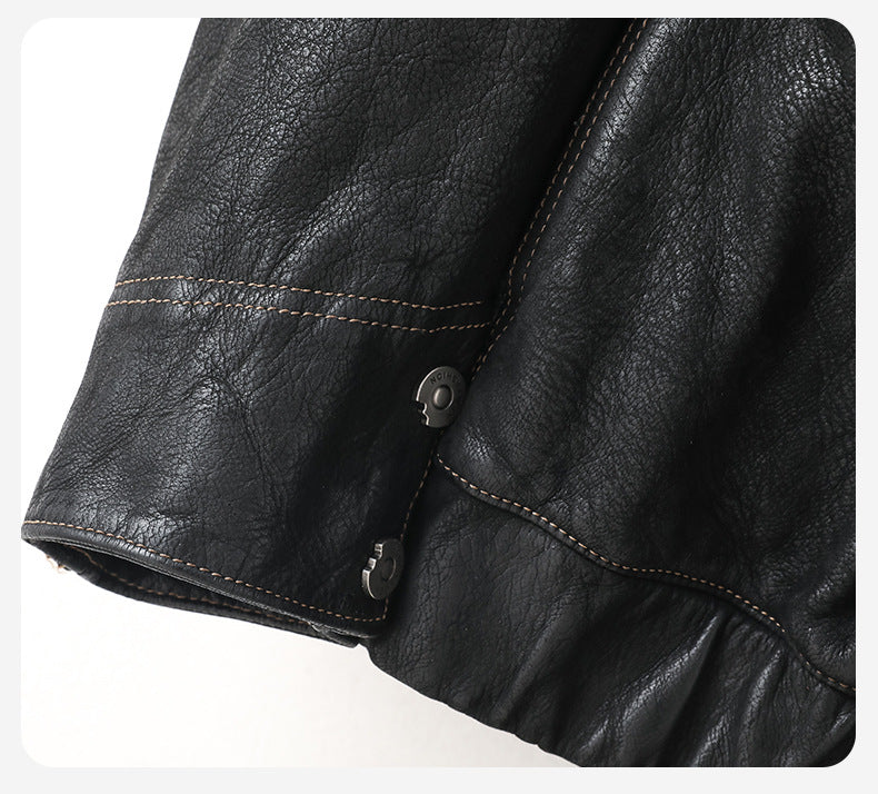 Close-up of the Noir Atlas Hooded Goatskin Jacket showcasing high-quality leather and stylish stitching