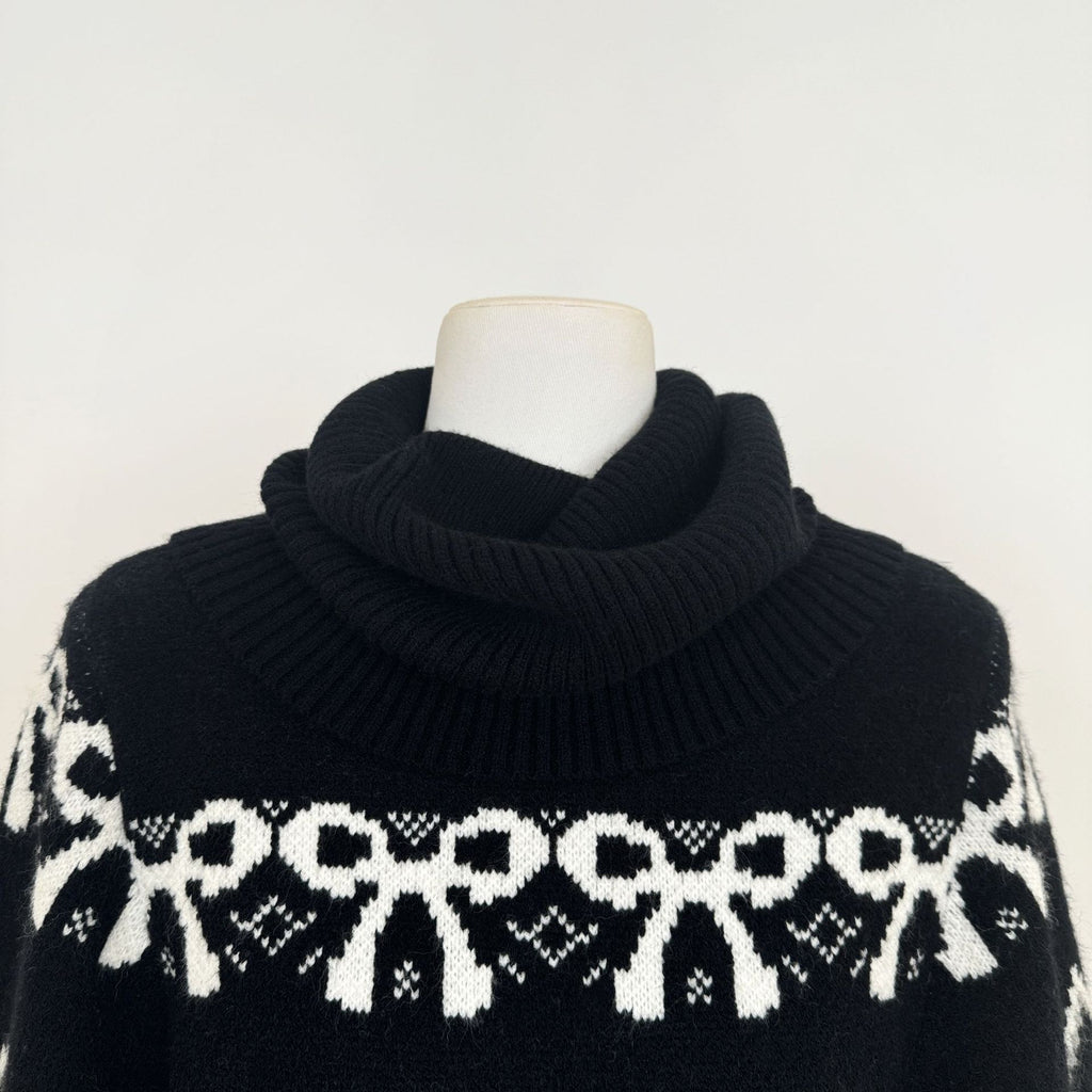 AM Vision RO Nordic Echo Knit Set featuring a cozy black sweater with white winter pattern
