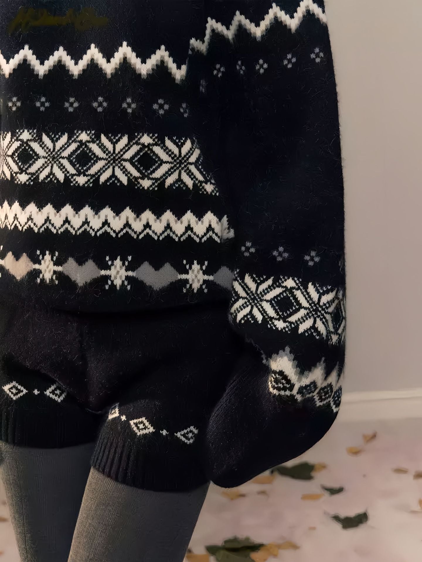 Cozy Nordic Echo Knit Set featuring a snowflake pattern in black and white, perfect for winter fashion
