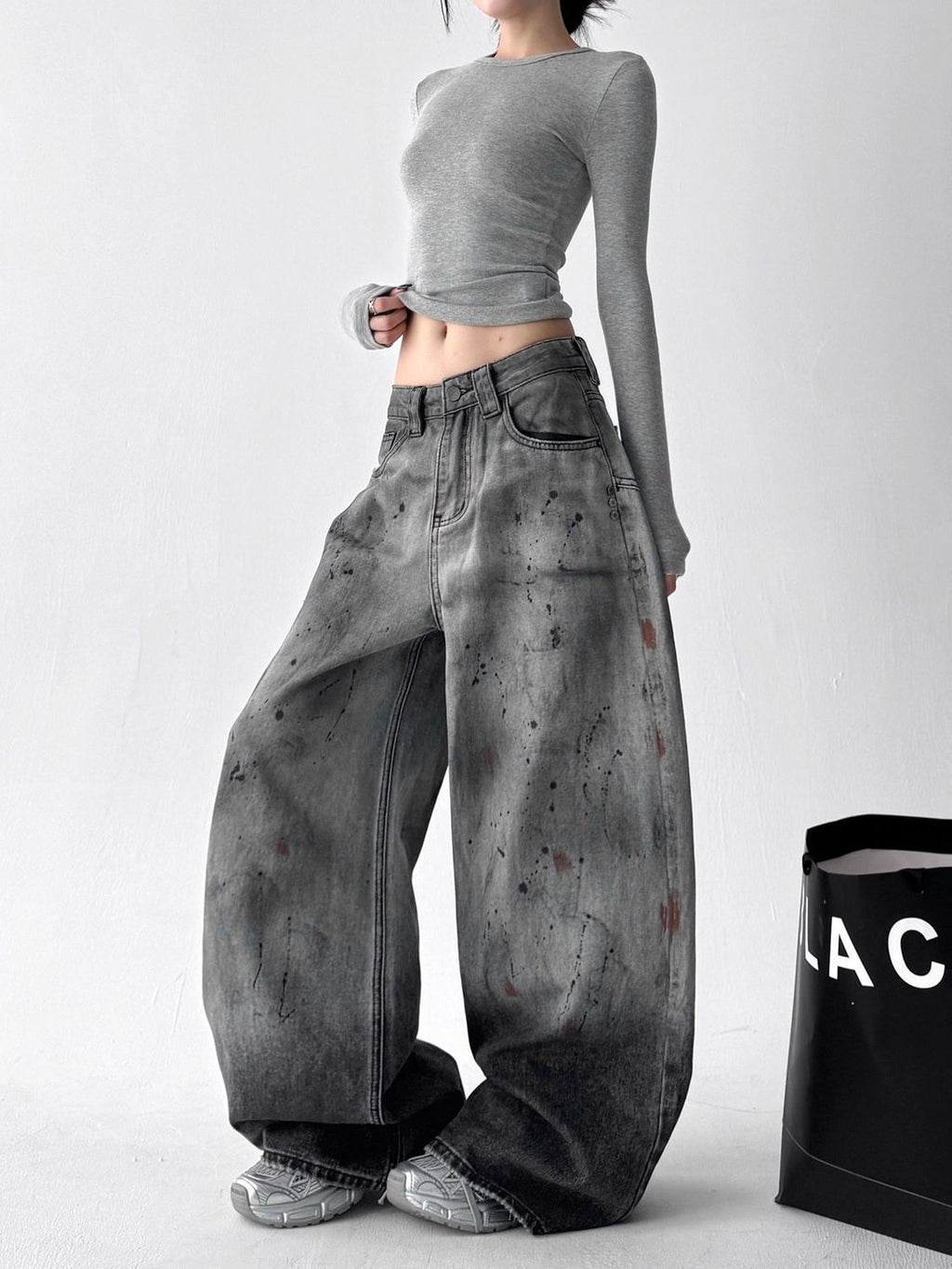 Ocean Curve Washed Street Jeans in a relaxed fit with stylish distressed detail and a model showcasing a casual outfit