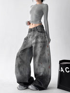 Ocean Curve Washed Street Jeans in a relaxed fit with stylish distressed detail and a model showcasing a casual outfit