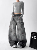 Trendy Ocean Curve Washed Street Jeans in a relaxed fit with a unique paint splatter design