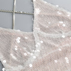 Close-up of AM Vision RO One-Shoulder Sequin Gown showcasing shimmering sequins and elegant design