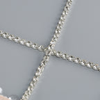 Close-up of the sparkling details on an AM Vision RO One-Shoulder Sequin Gown featuring intricate embellishments