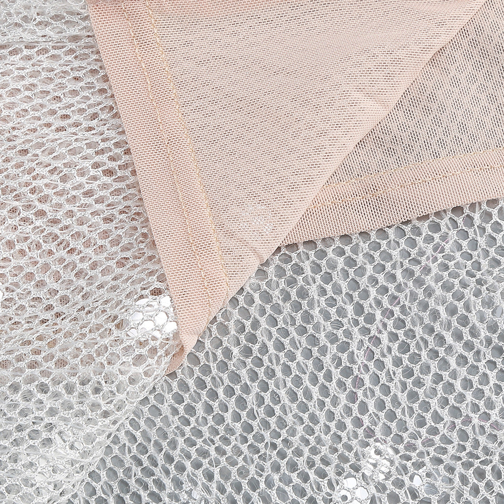 Detail of fabric showing a One-Shoulder Sequin Gown with elegant sequins and soft mesh texture