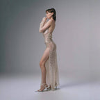 Elegant AM Vision RO One-Shoulder Sequin Gown Featuring a Side Slit and Sheer Design
