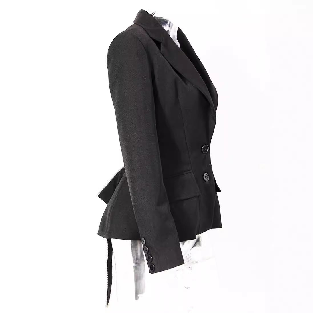 Side view of an Open Back Blazer with Decorative Stone Lacing featuring a tailored fit and elegant design