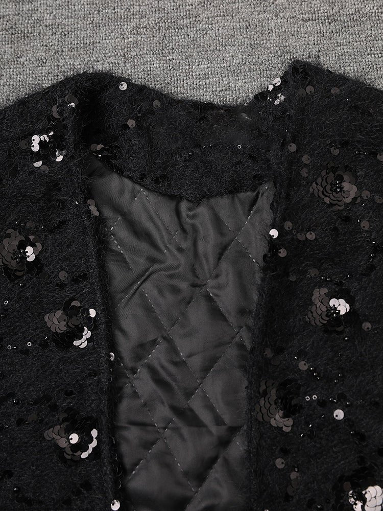Stylish black Oversize Jacket with Applications featuring sequin detailing and quilted interior
