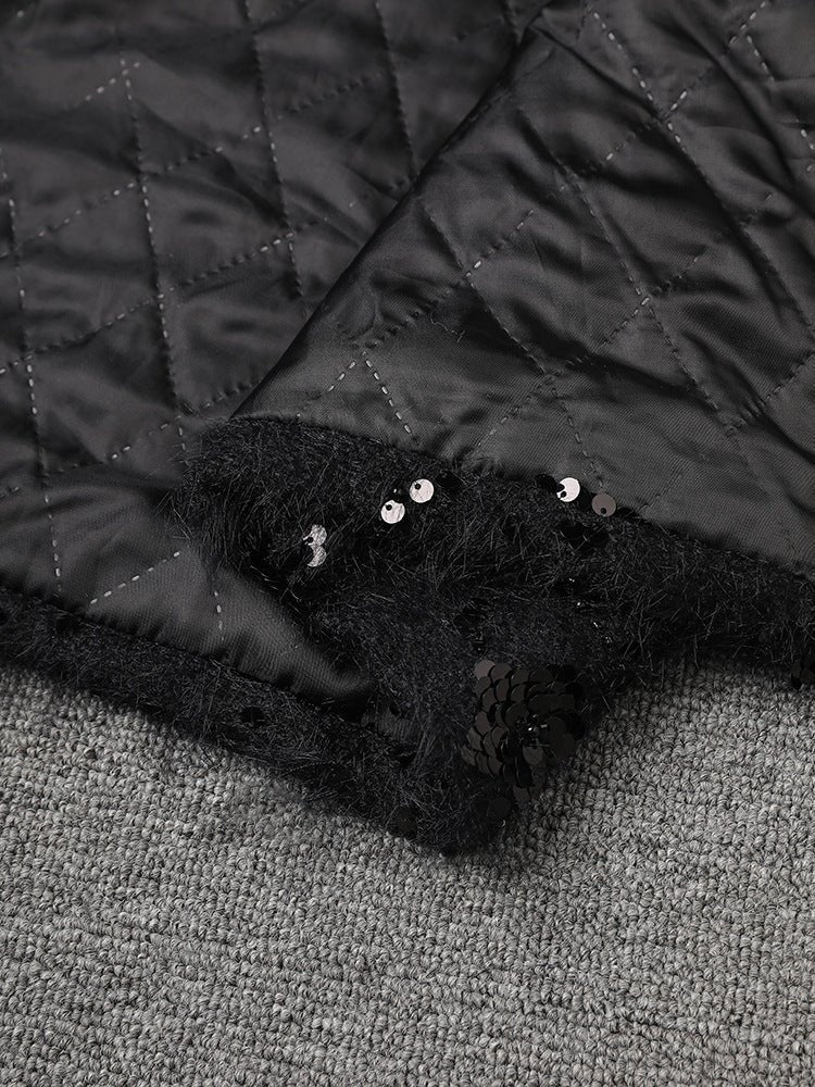 Textured black Oversize Jacket with Applications showcasing stylish sequined detail and quilted design