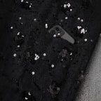 Black Oversize Jacket with Applications featuring sequin embellishments and a hidden pocket for phone storage