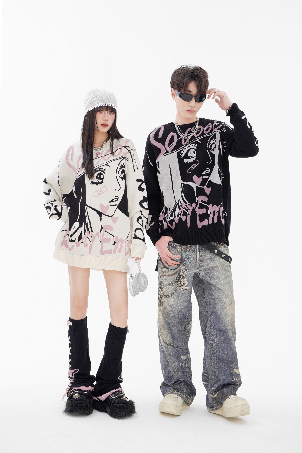Couple wearing Oversized Anime Sweater featuring bold graphic designs and playful colors for a stylish look