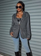 Model wearing an Oversized Sequin Cardigan Blazer with a chic black top and stylish accessories