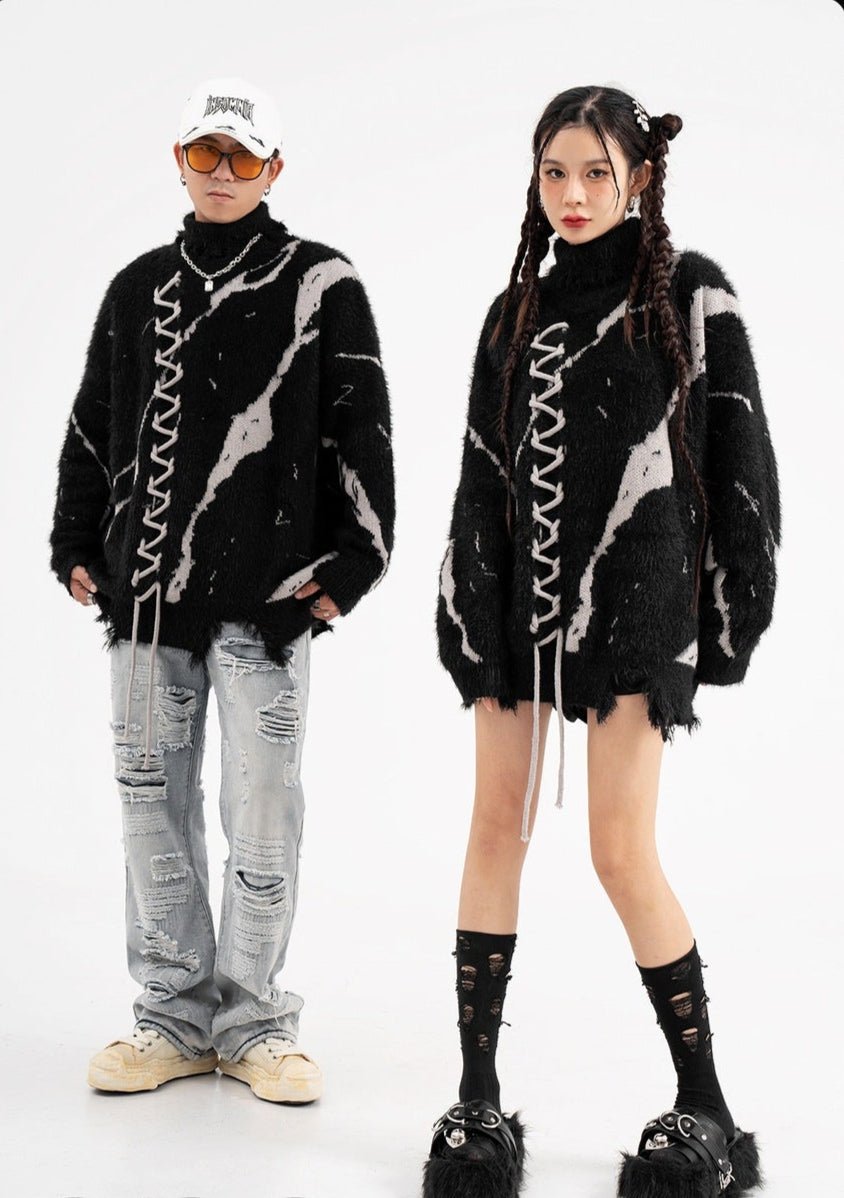 Oversized Sweater With Dark Street Design And Distressed Details on model with stylish accessories