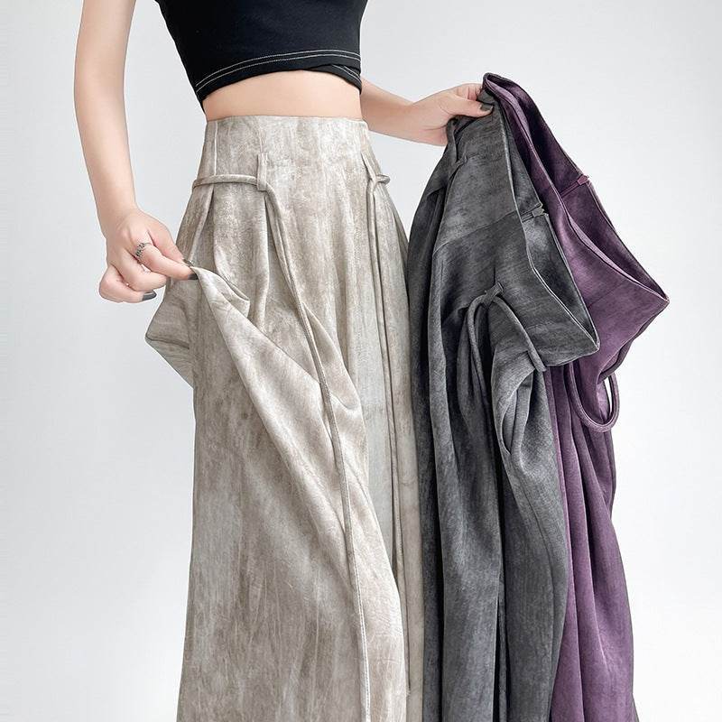 Pantaloni casual wide-leg în trei culori diferite, ținute de o persoană, creați de AM Vision RO
