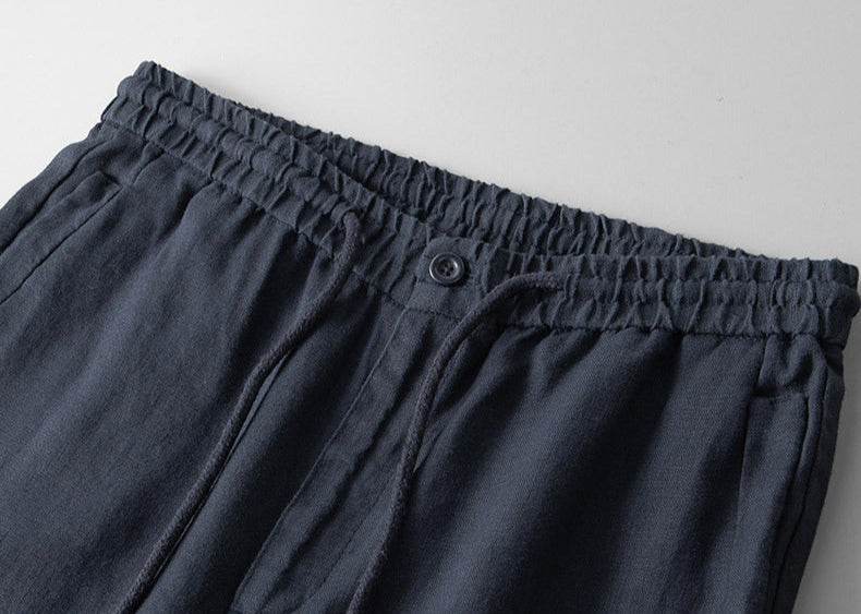 Pantaloni din in pentru bărbați de culoare închisă cu talie elastică și nasture, confortabili și eleganți