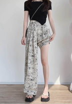 Pantaloni asimetrici de dama cu un picior lung si imprimeu floral alb-negru AM Vision RO
