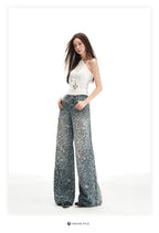 Pantaloni largi din denim cu imprimeu leopard, stilați pentru un look modern și confortabil