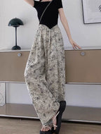 Pantaloni largi cu imprimeu floral pentru femei, confortabili și eleganți de la AM Vision RO