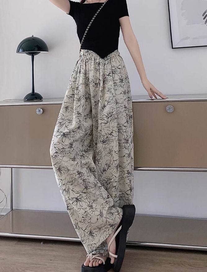 Pantaloni largi cu imprimeu floral pentru femei, confortabili și eleganți de la AM Vision RO