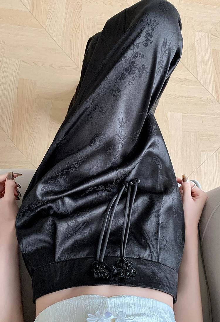 Pantaloni largi negri din material satinat cu imprimeu floral subtil și șnur reglabil AM Vision RO