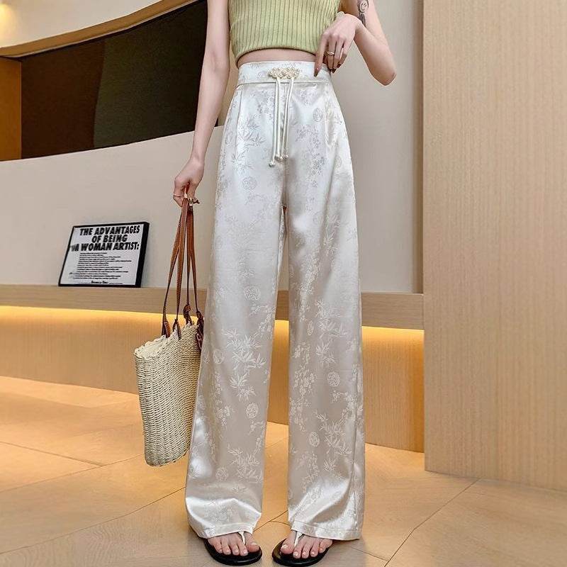 Pantaloni largi din satin cu model floral subtil și talie înaltă cu șnur pentru femei