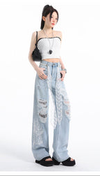 Pants with Lace and Rips - High Waist in light blue with decorative lace details and distressed rips