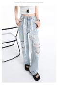 Stylish Pants with Lace and Rips - High Waist in light blue with unique distressed detailing