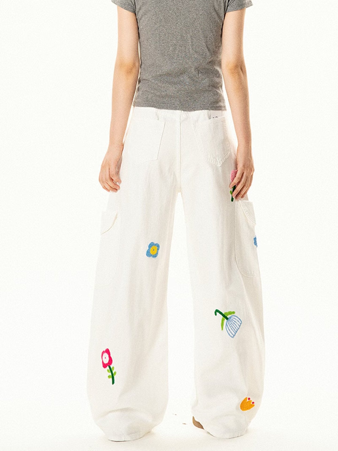 AM Vision RO Petal District Cargo Pants in white with colorful floral embroidery for casual style