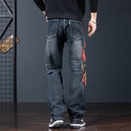 Back view of Phoenix Flight Embroidered Jeans featuring vibrant flame embroidery and a modern fit