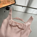 Close-up of the Pink Lotus Bow Princess Dress showcasing the bow detail on the front