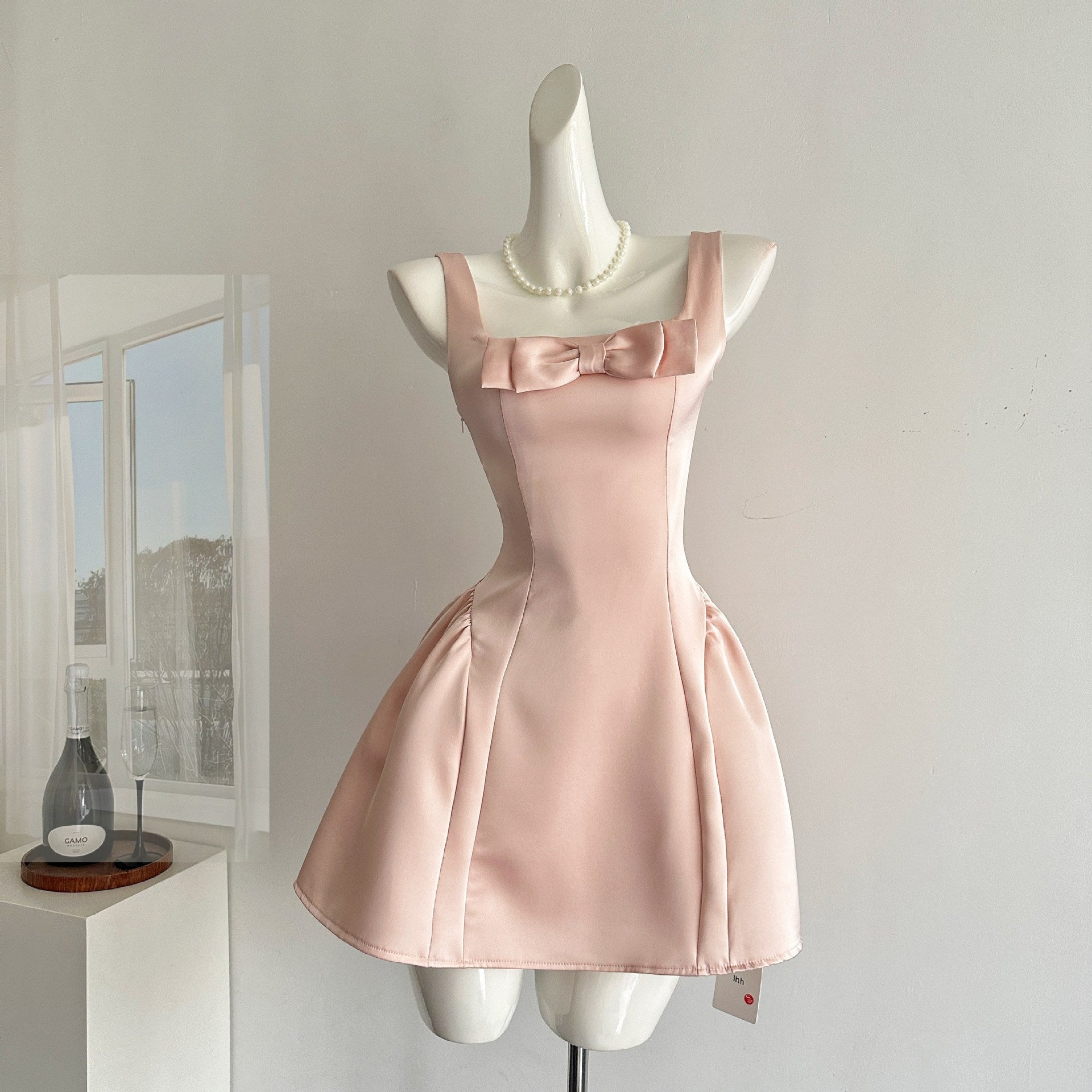 Elegant Pink Lotus Bow Princess Dress with a flattering a-line silhouette and shoulder straps
