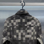 Back view of a Plaid Jacquard Denim Jacket featuring a unique patchwork design