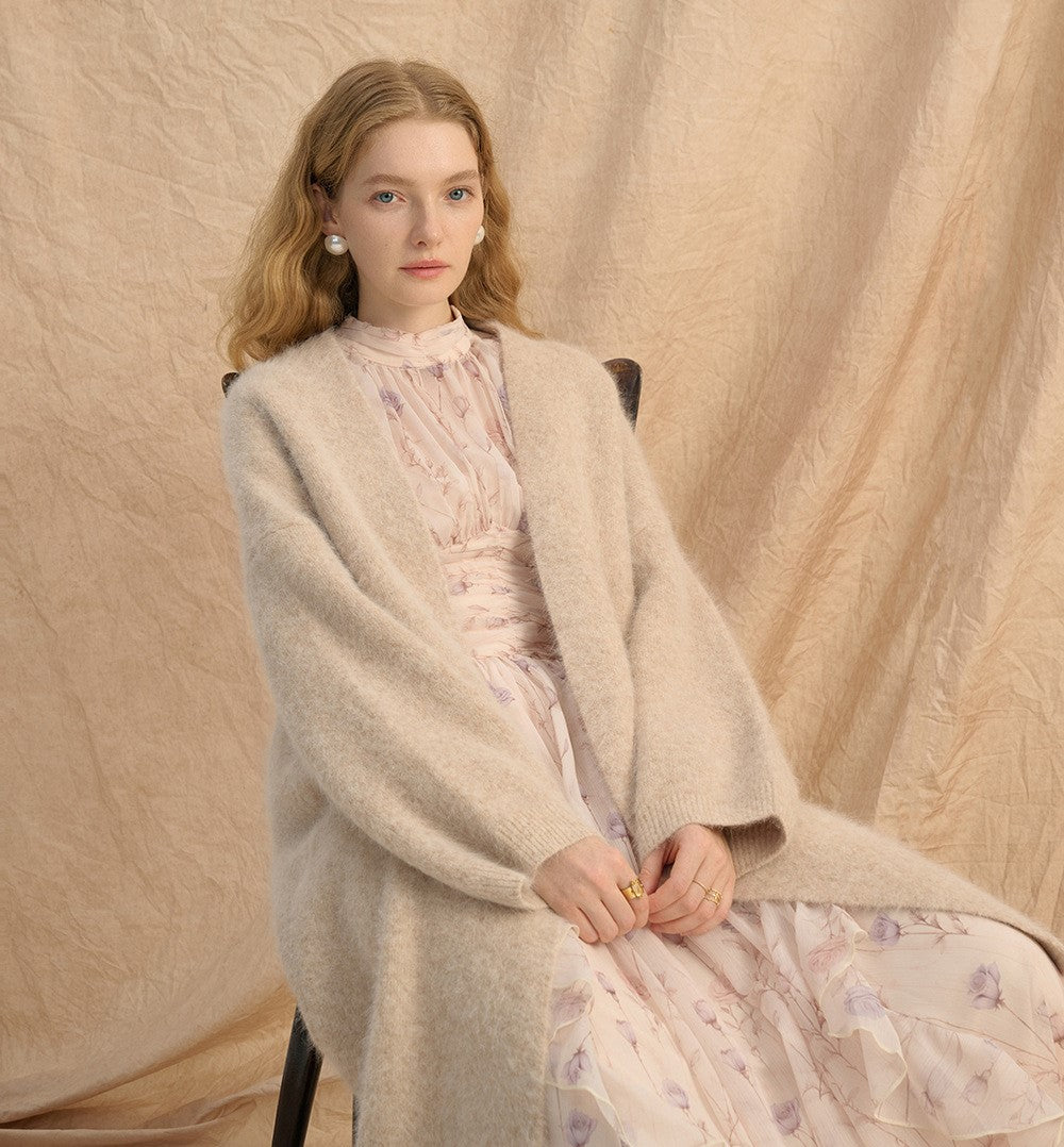 Provence Bloom Midi Dress in light pink floral fabric, styled with a cozy oversized cardigan
