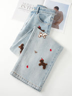Puppy Embroidered Retro Wide Leg Jeans in light blue with playful teddy bear designs and red accents