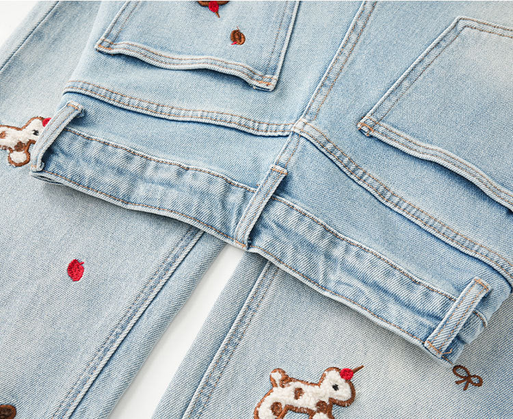Puppy Embroidered Retro Wide Leg Jeans in light blue with playful dog designs and a relaxed fit