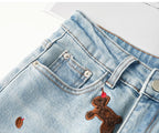 Close-up of Puppy Embroidered Retro Wide Leg Jeans featuring cute embroidered designs on denim fabric