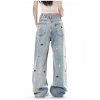 Puppy Riot Straight Jeans in light blue with playful embroidered designs on the back