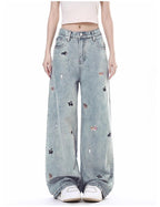 Puppy Riot Straight Jeans in light blue with colorful puppy embroidery details for a playful style