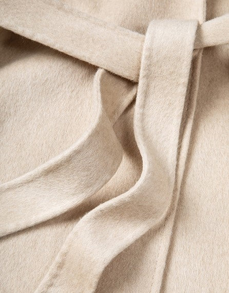 Close-up view of the fabric detail of the Red Double Sided Cashmere Maxi Coat showing the soft texture