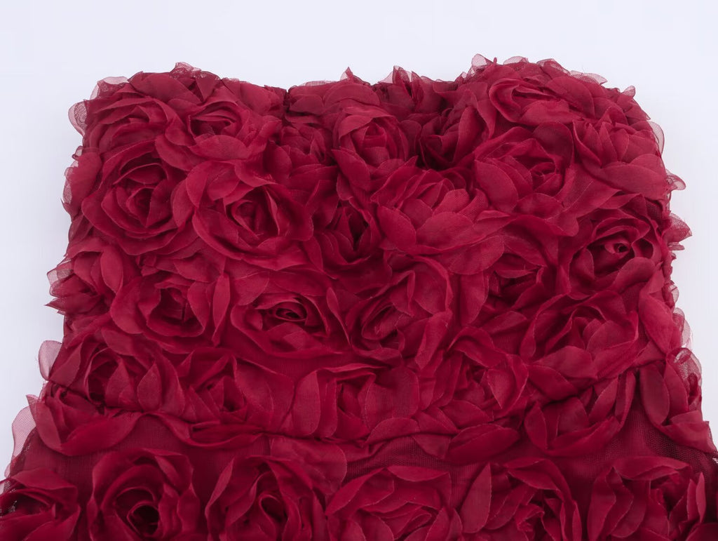 Red Rose Blossom Dress featuring a floral fabric design with layered rose appliques