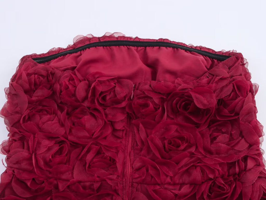 Close-up of the Red Rose Blossom Dress featuring 3D floral embellishments for a romantic look