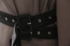 Close-up of a Retro Blazer with Belt featuring a stylish buckle and eyelet details