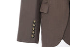 Close-up of a Retro Blazer with Belt showcasing elegant buttons and tailored sleeve details