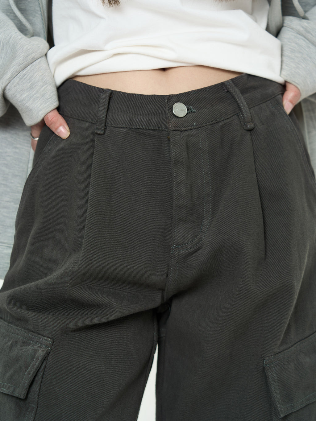Close-up of Retro Cargo Pocket Wide Leg Denim Pants in dark color with a relaxed fit