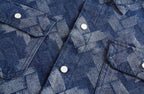 Close-up of AM Vision RO Retro Denim Shirt for Men featuring unique woven texture and snap buttons