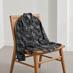 AM Vision RO Retro Denim Shirt for Men in black and grey pattern displayed on a wooden chair
